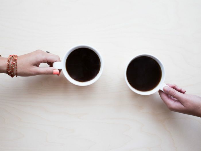 People drinking coffee at a Death Cafe
