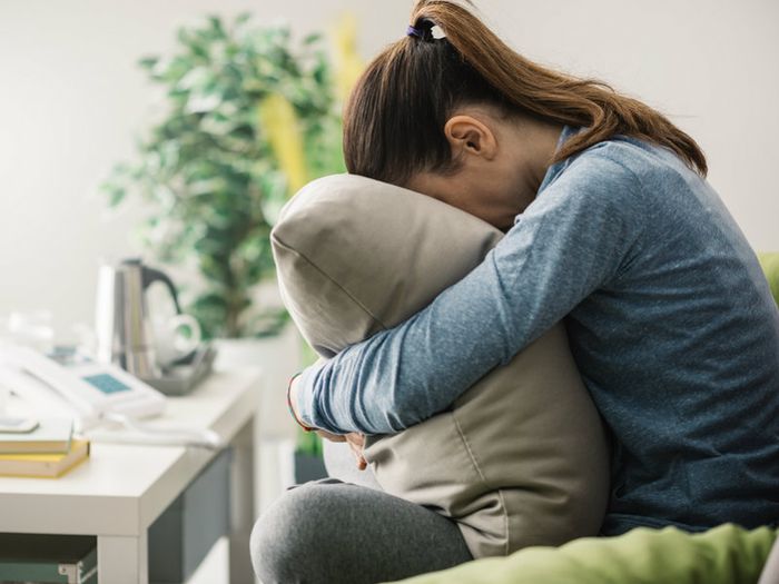 Woman grieving after the death of a child