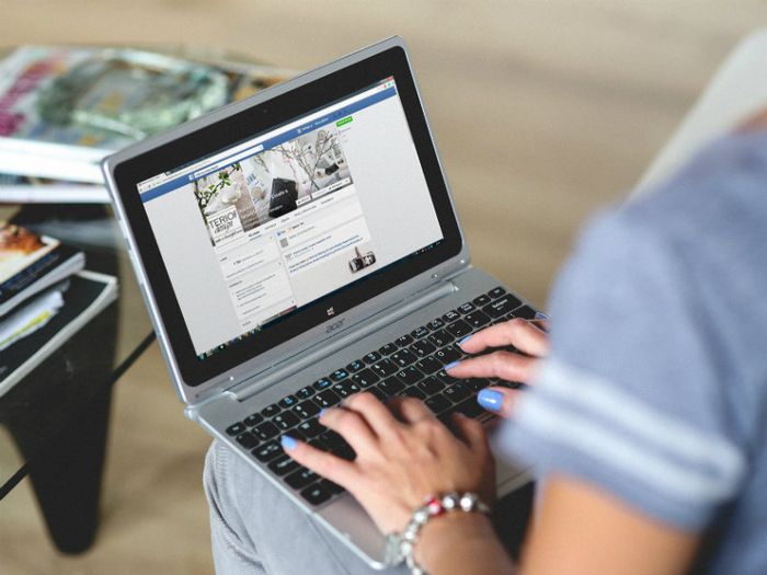 Woman posting on social media