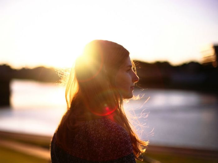 Grieving woman thinking alone