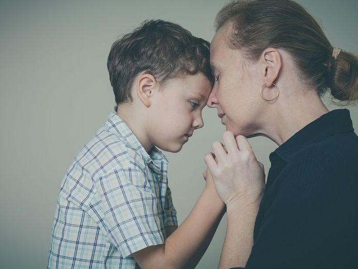 A grieving mother and child