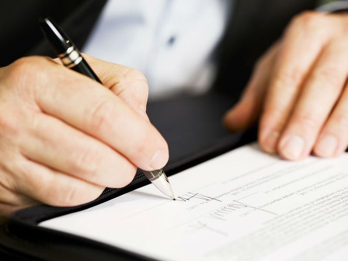 signing a funeral plan