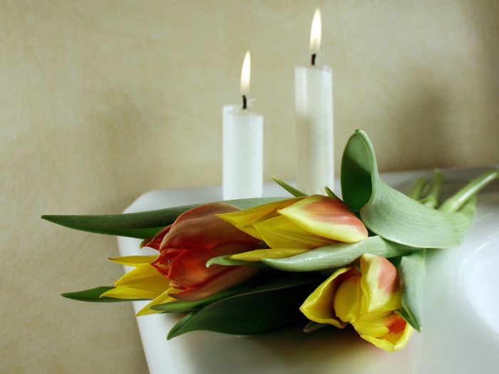 Candles and flowers at a Humanist funeral service