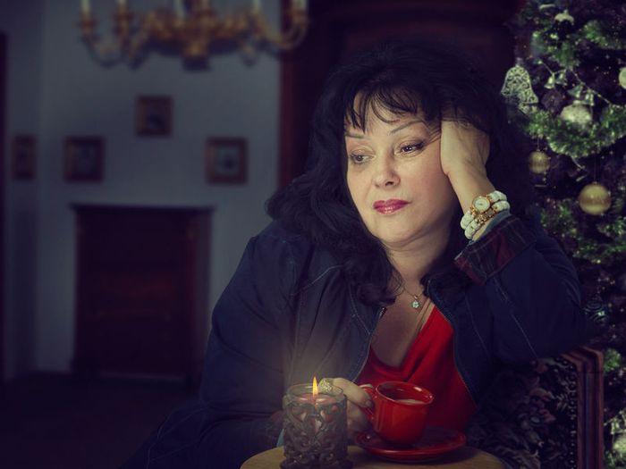 A grieving woman lost in thought