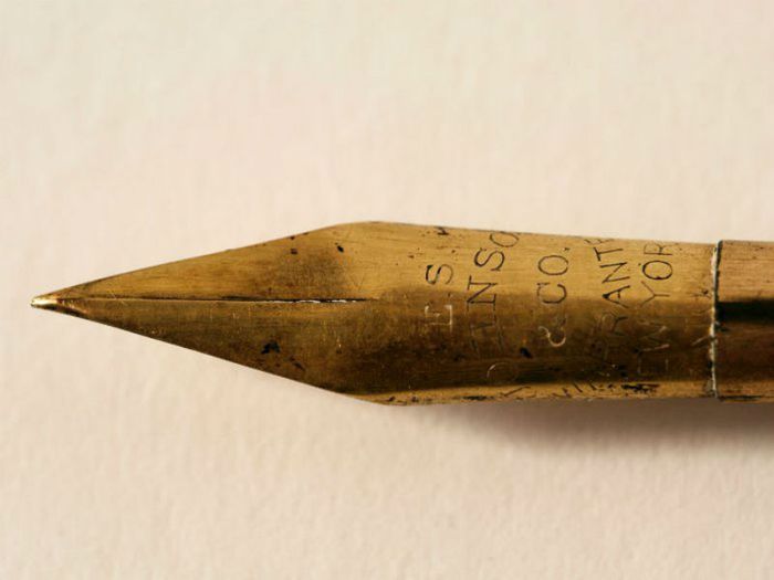 writing a funeral excuse letter- a pen nib
