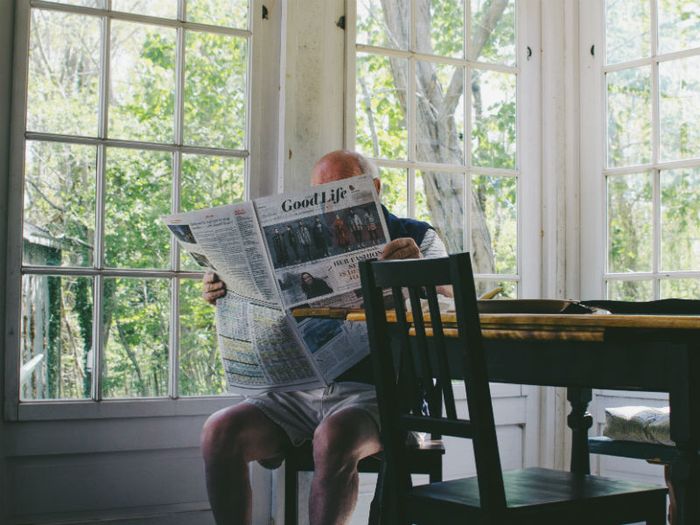 reading a newspaper