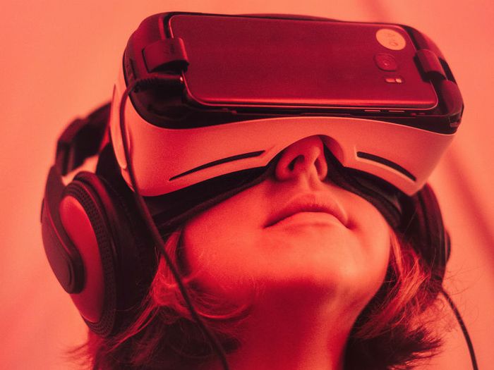 Patient using a virtual reality headset to experience a simulation for end of life care