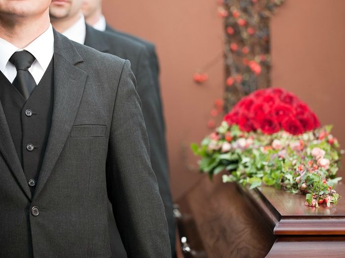 Pallbearers carrying a coffin