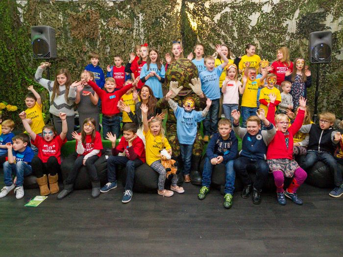 Children supported by Forces family charity Scotty's Little Soldiers enjoy a Christmas party
