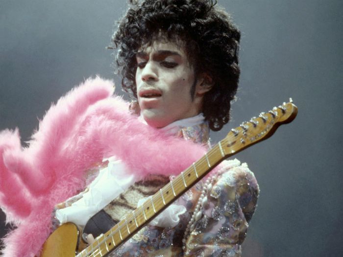Prince playing guitar